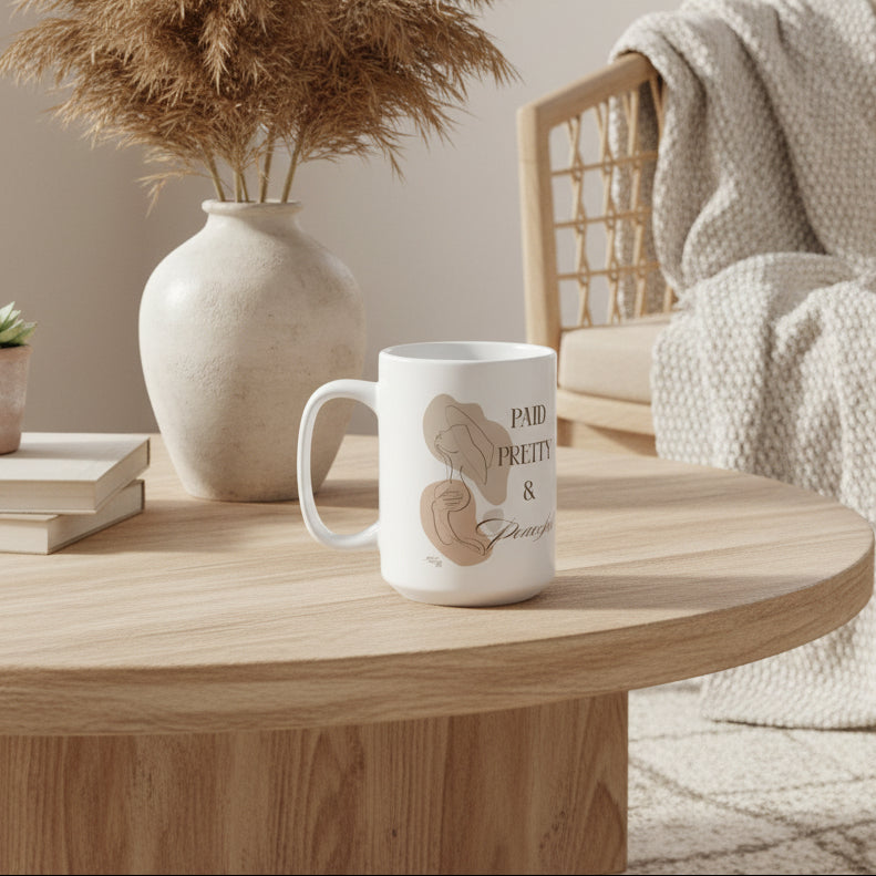 White mug with artistic illustrations and text on a white background